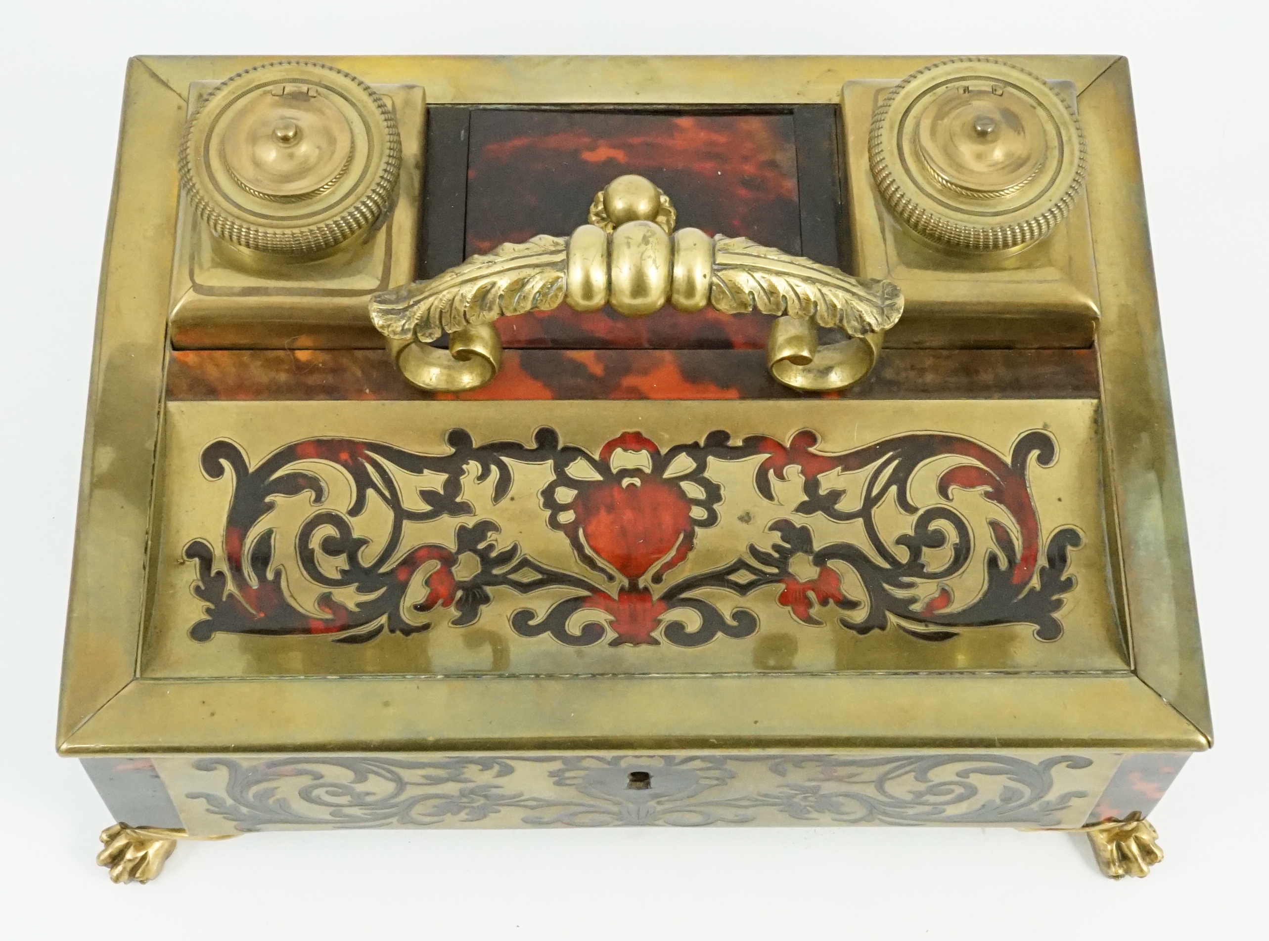 A 19th century Louis XIV style red boulle inkstand, 25cm wide, 18cm deep, 13cm high